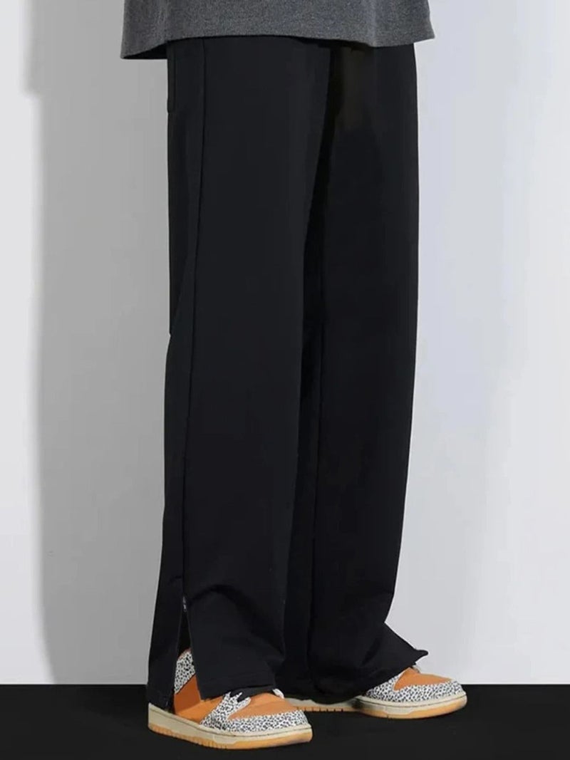 FLYNOFF Black Solid Loose Fit Men's Track Pant - Image 1